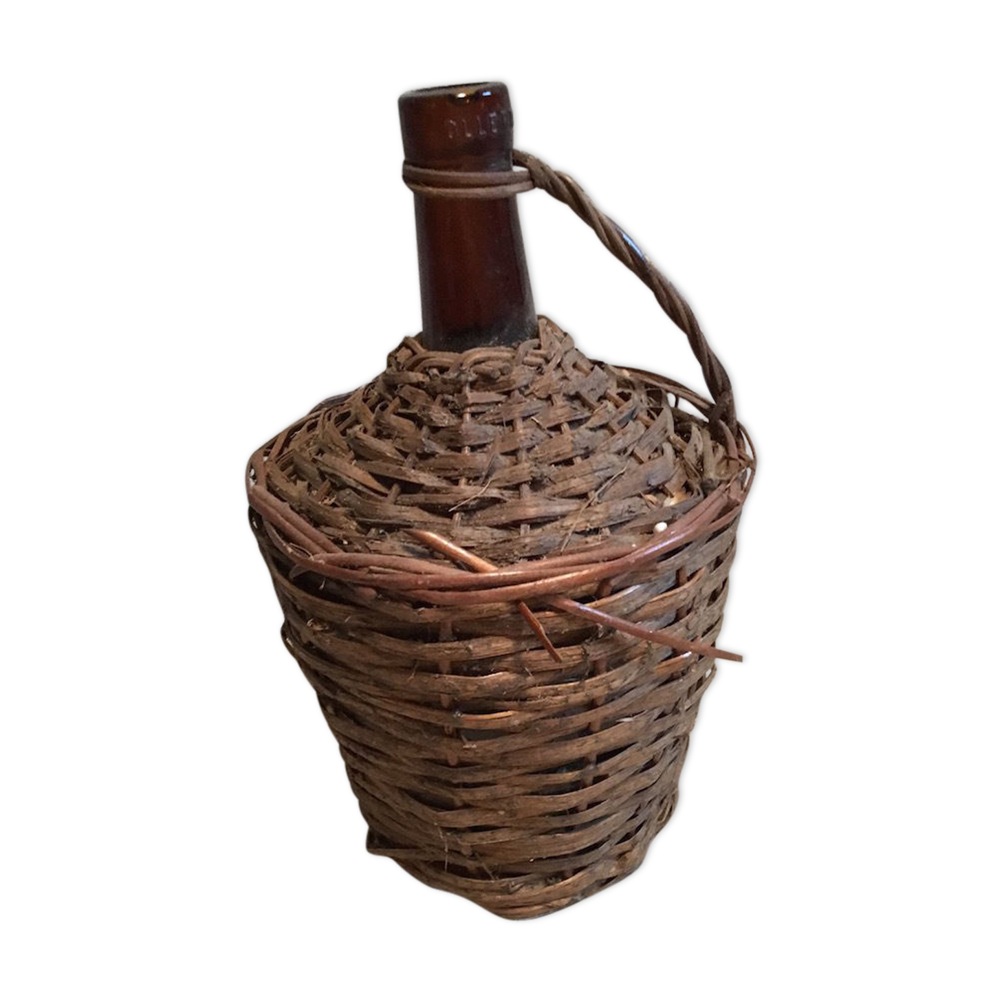 Tank in old glass and wicker