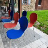 Blue and terracotta ant chairs with eye pattern