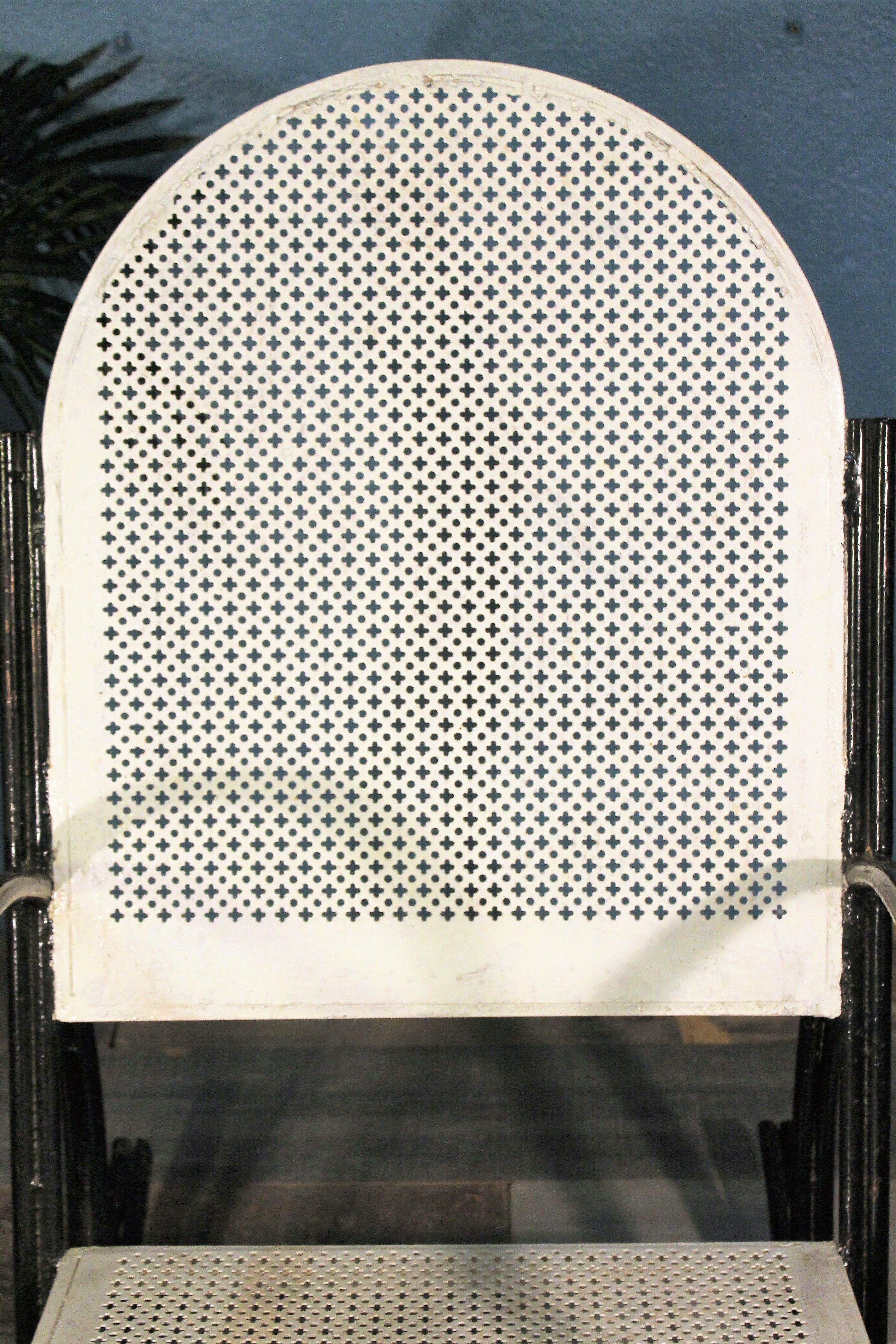 1950s perforated metal rocking chair