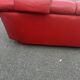 Three-seater red full-grain leather sofa – Vintage Italian design from the years.