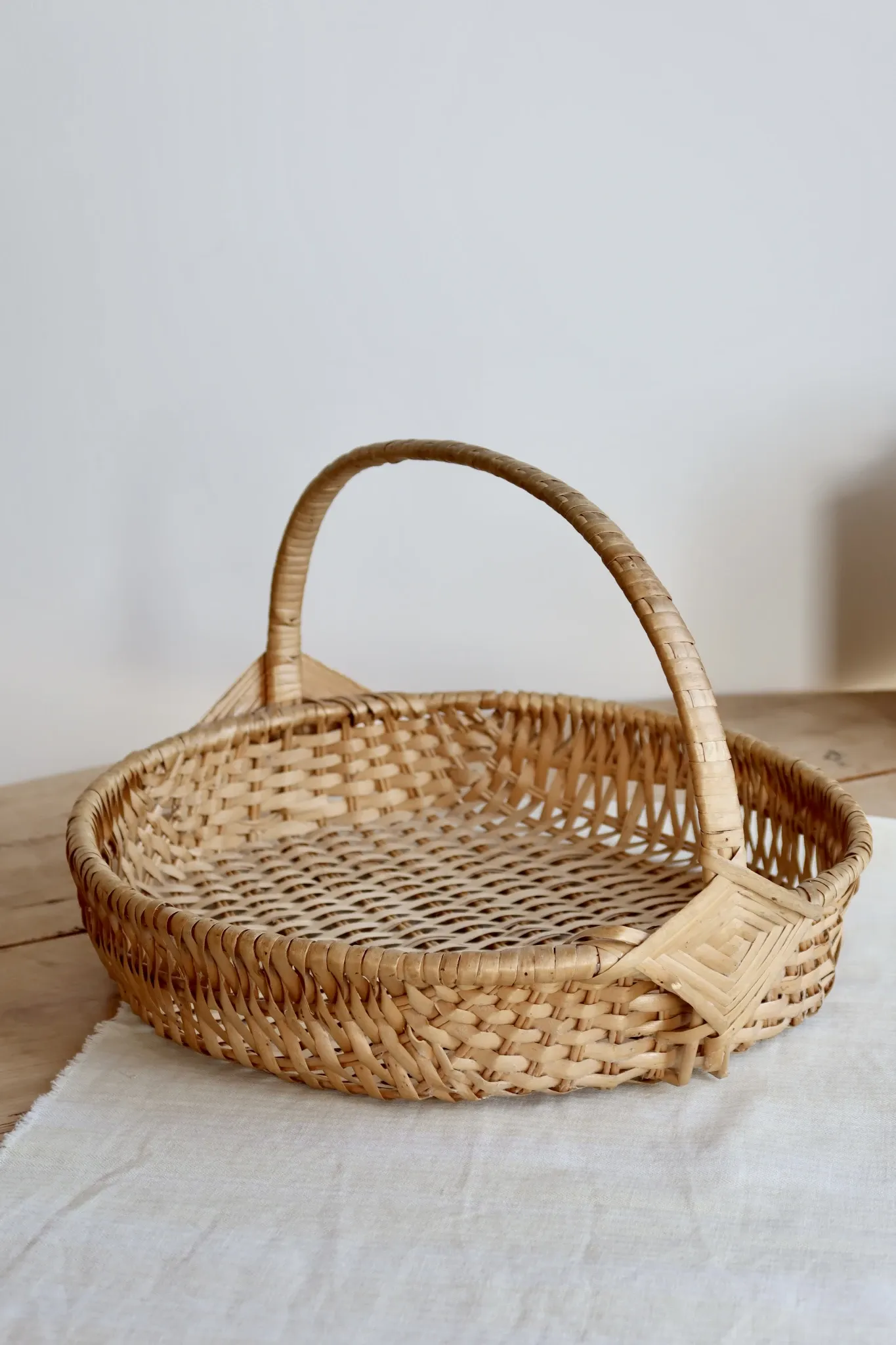 Vintage hand-woven wicker harvest basket