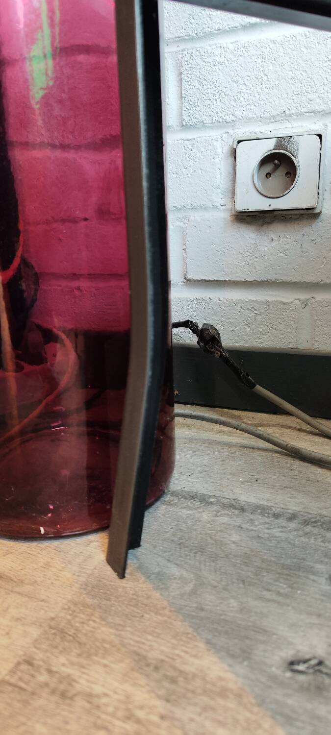 old medical display case with a graphite metal door