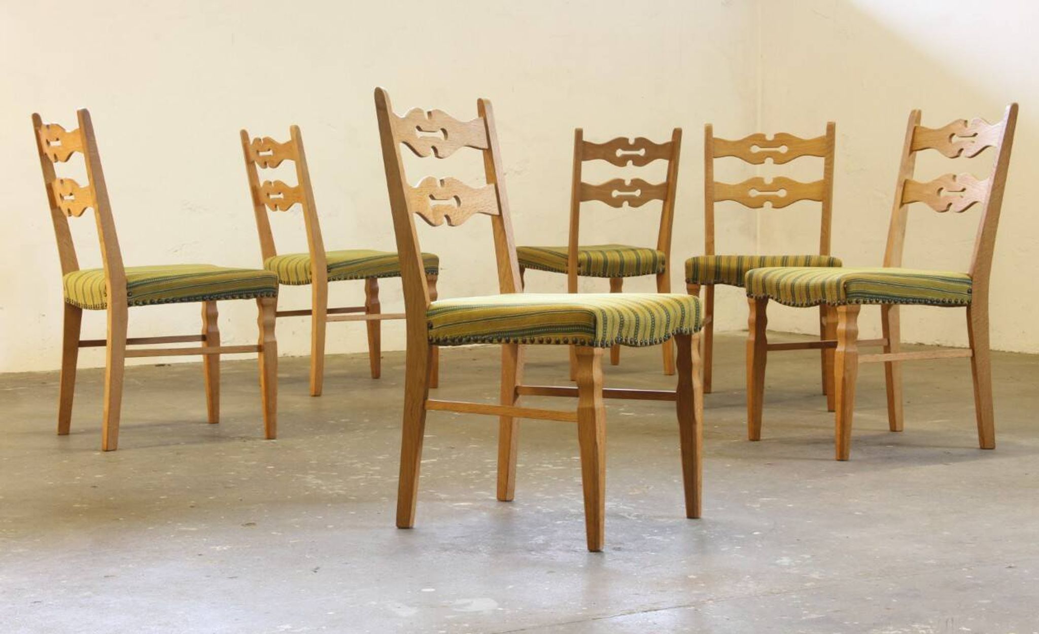 Vintage 1960s brutalist Danish modern oak dining chairs in the style of Henning Kjærnulf