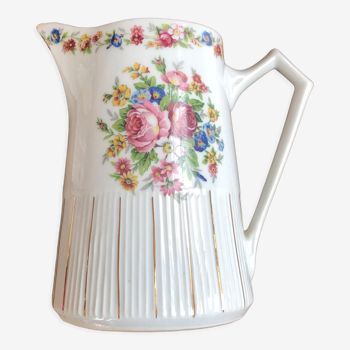Porcelain pitcher with flowers