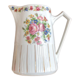 Porcelain pitcher with flowers
