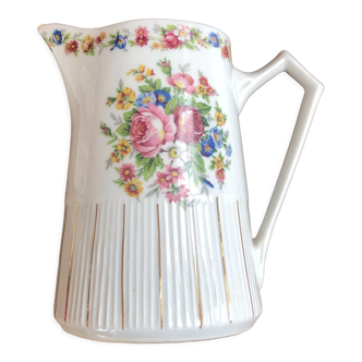 Porcelain pitcher with flowers