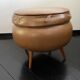 Light brown leather pouf with storage