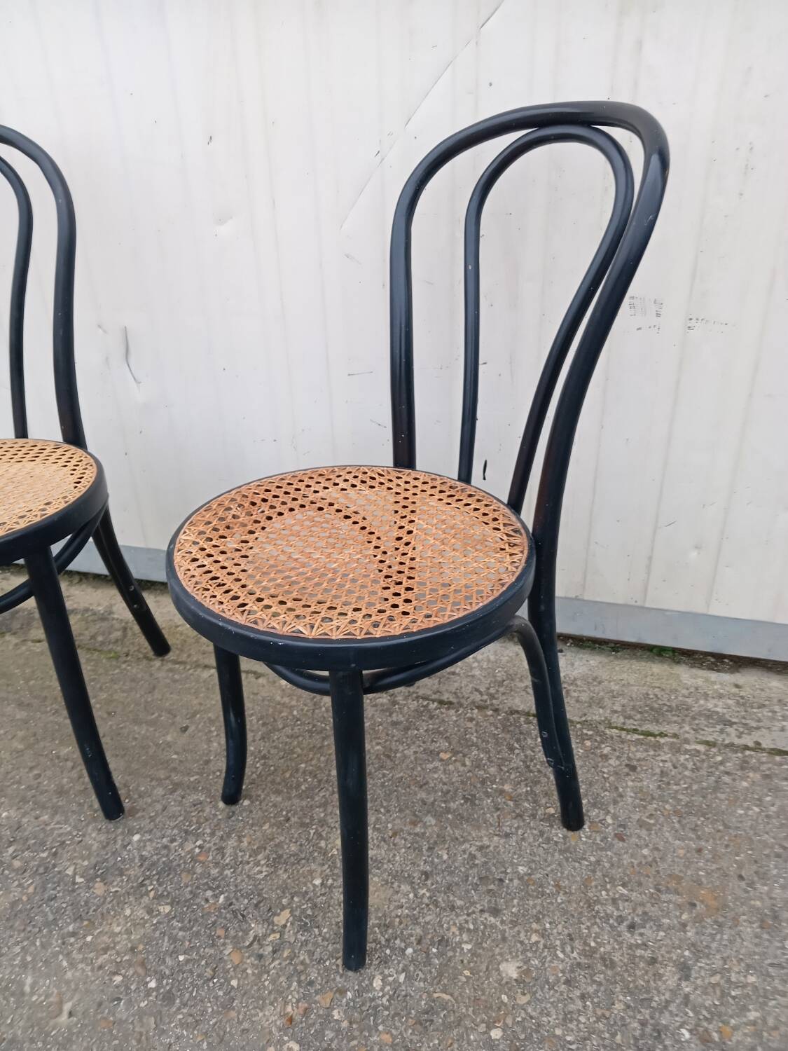 Pair of fmg bentwood and cane bistro chairs
