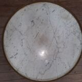 Tablr low dessu marble called "hot water bottle"