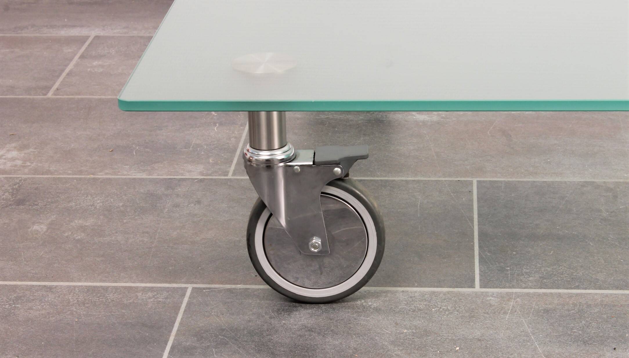 Wheeled glass coffee table