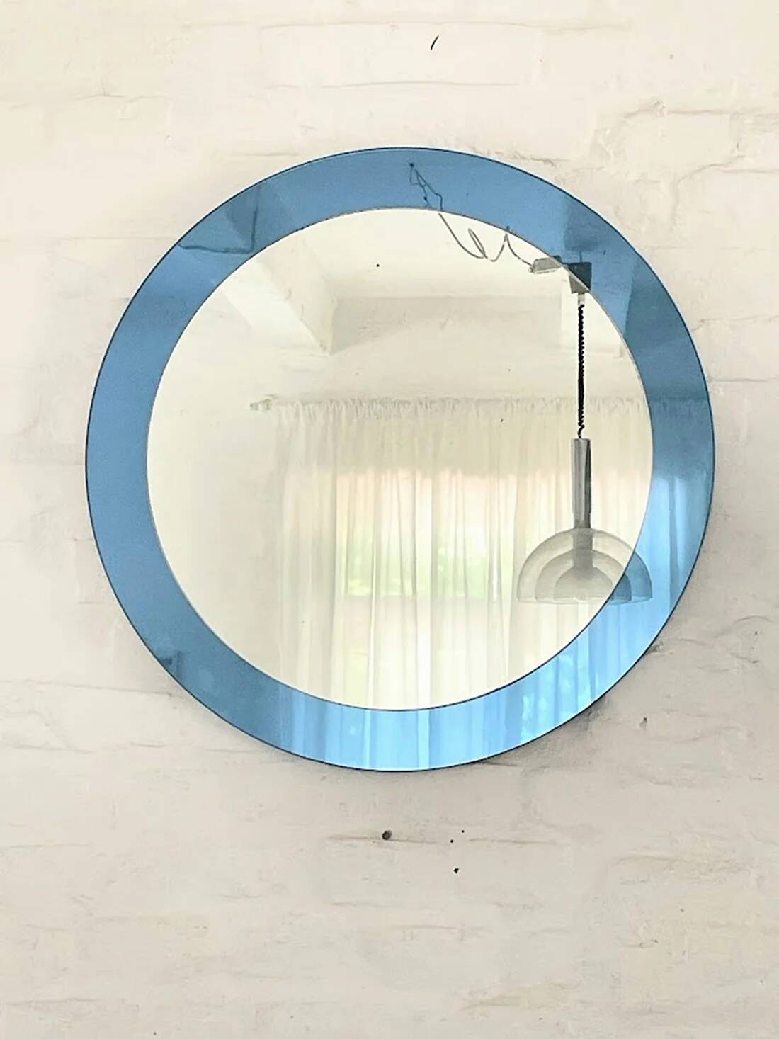 Blue glass wall mirror, Italian, circa 1960s-1970s.