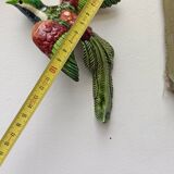 Two exotic birds in slip to hang