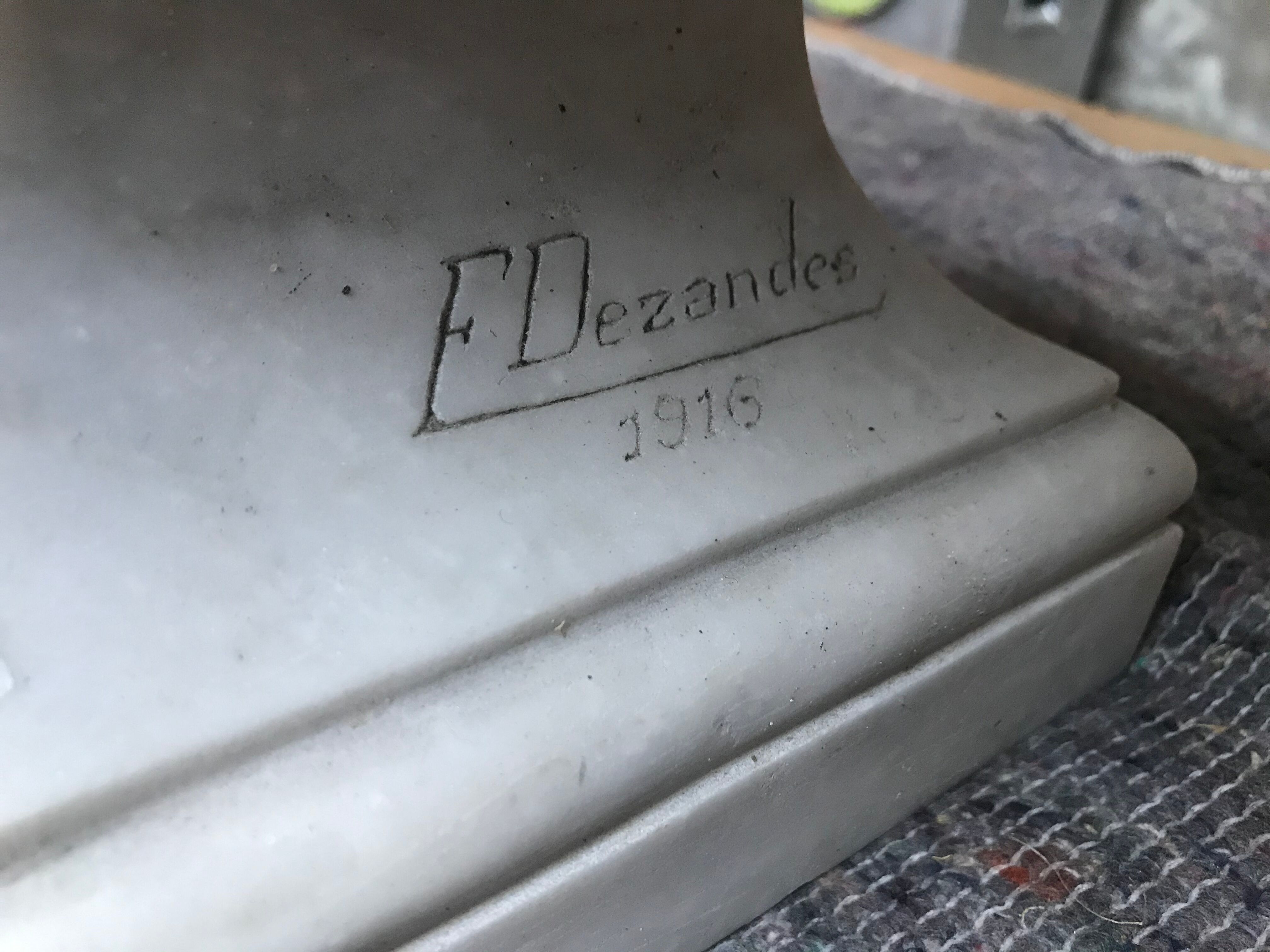 Man bust in square marble signed "F. Dezandes"