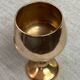 Green stemmed, brass chalices