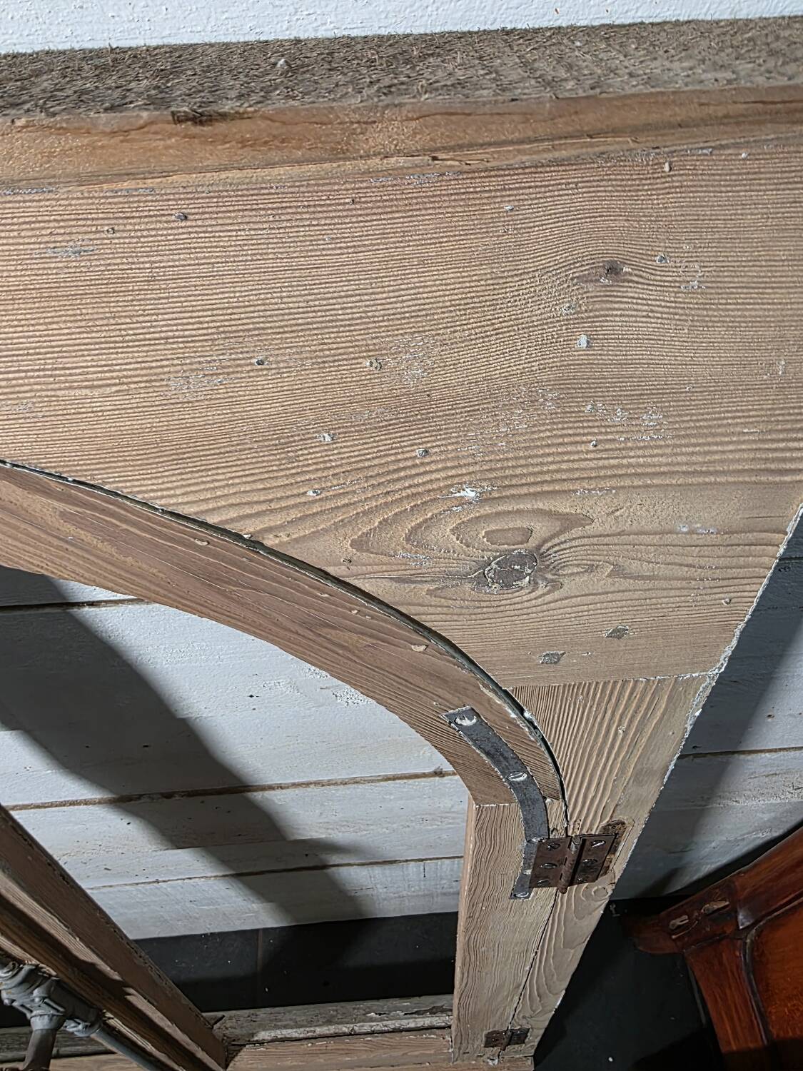 Old arched window made of fir wood