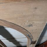 Old arched window made of fir wood