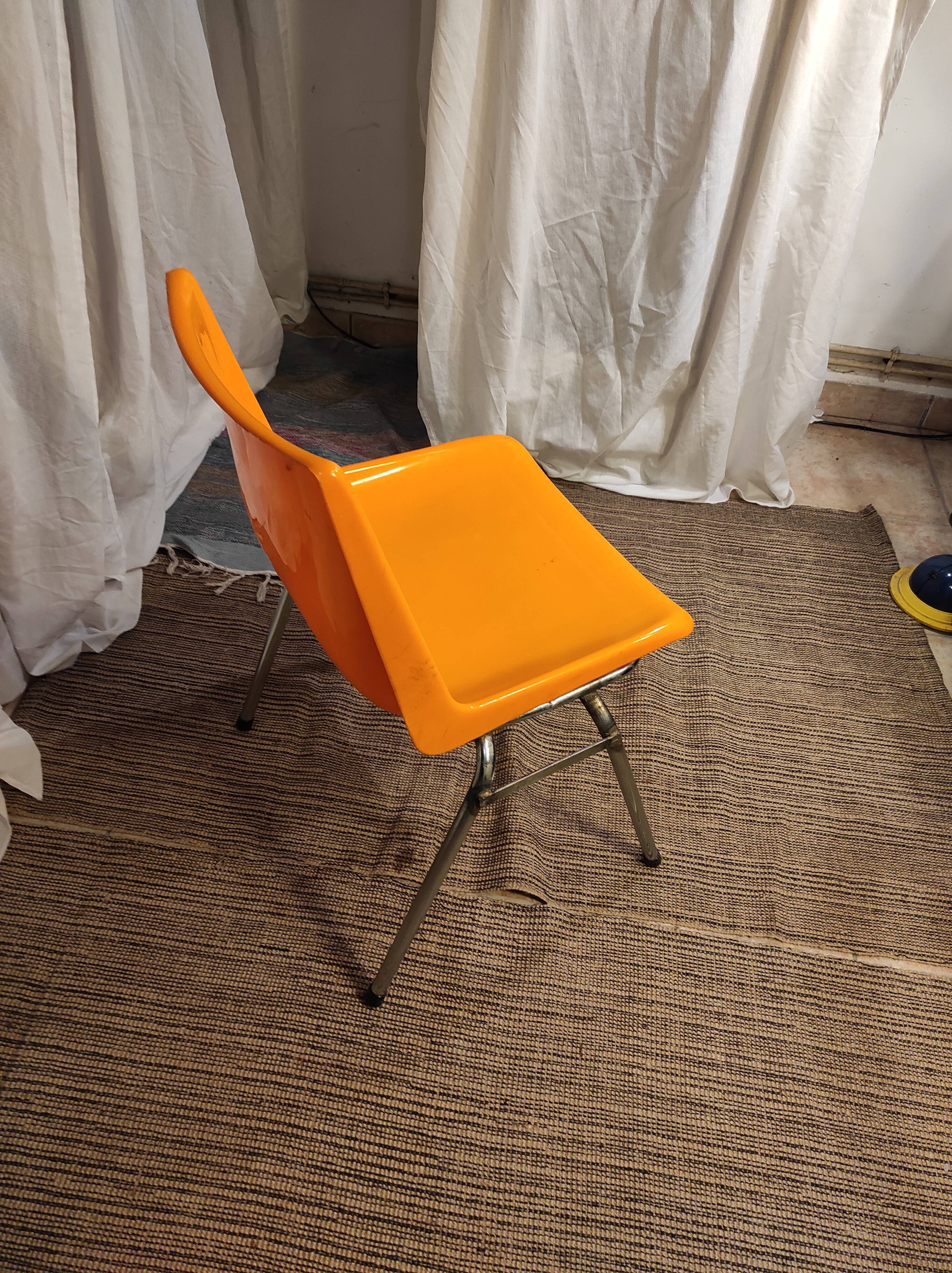 Orange plastic chair 1970