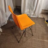 Orange plastic chair 1970