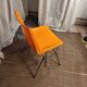 Orange plastic chair 1970