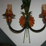 Pair of vintage floral wall sconces in Italian Florentine style metal.