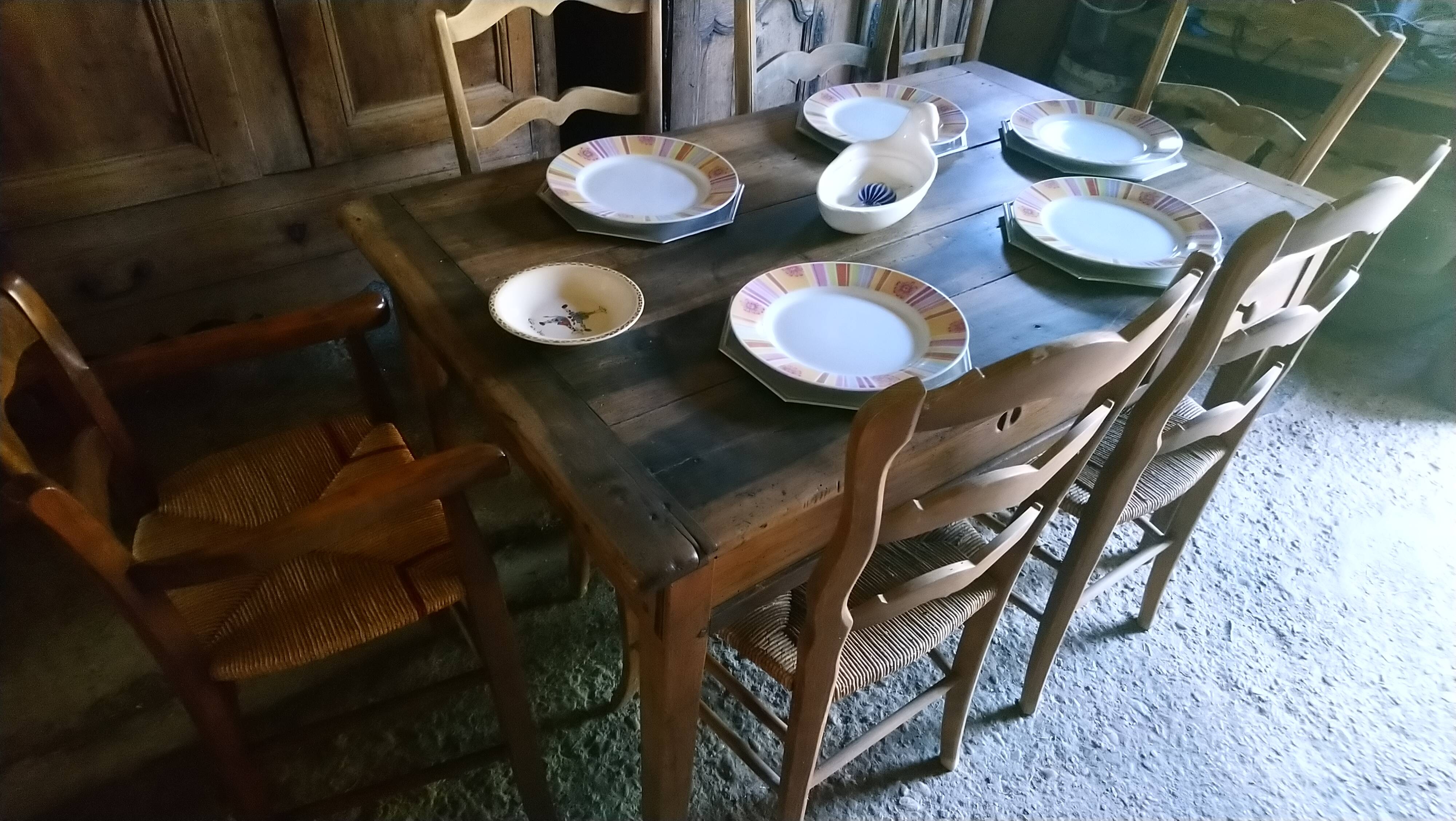 Child's high chair with a rush seat in walnut