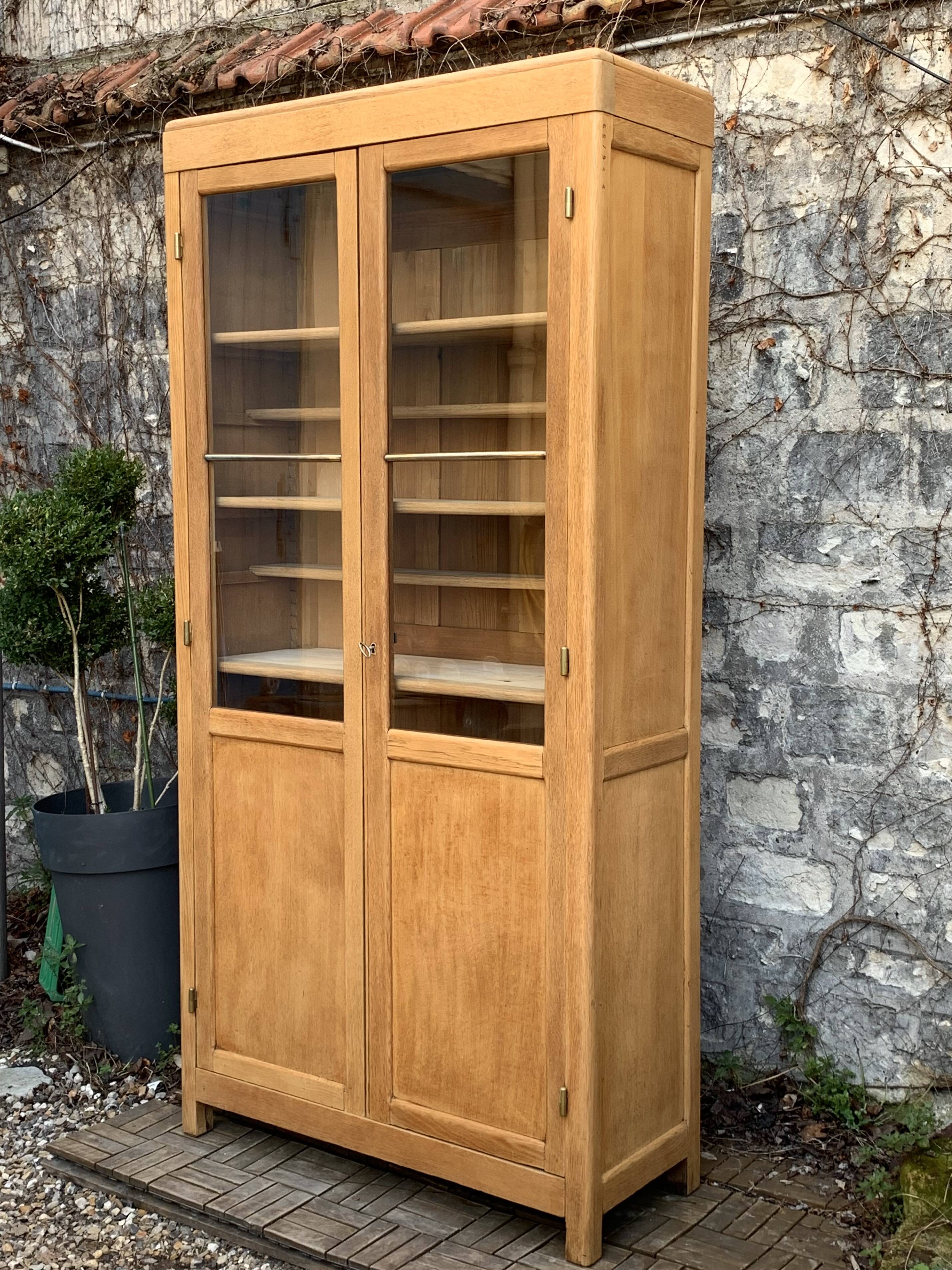 Parisian glass cabinet in solid raw oak, 1950