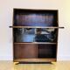 Solid oak secretary with golden feet
