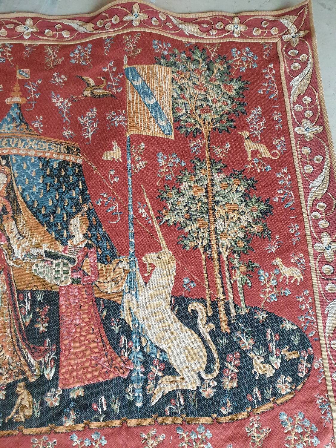 Old tapestry Lady and the Unicorn