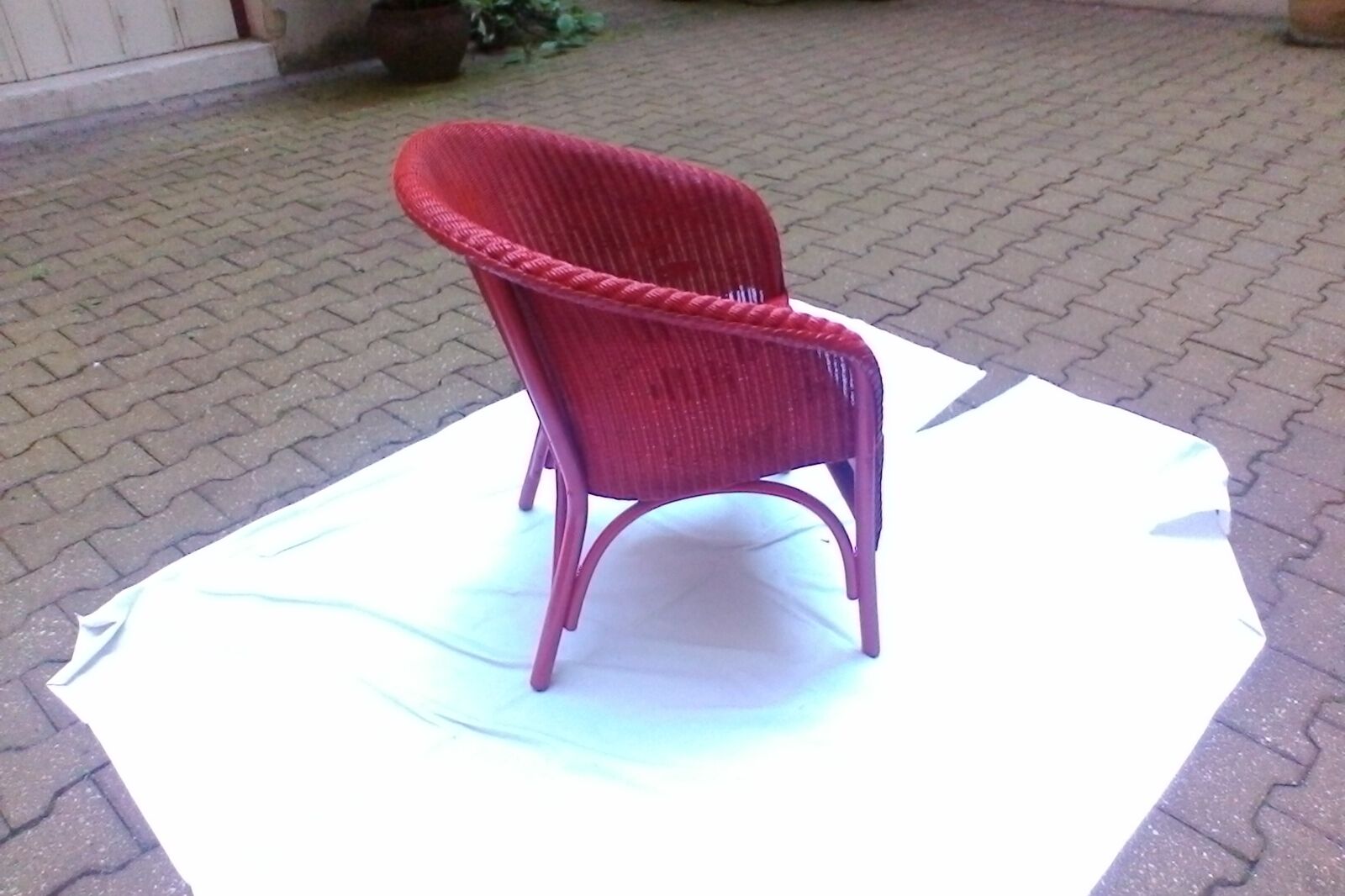 Vintage chair in red rattan