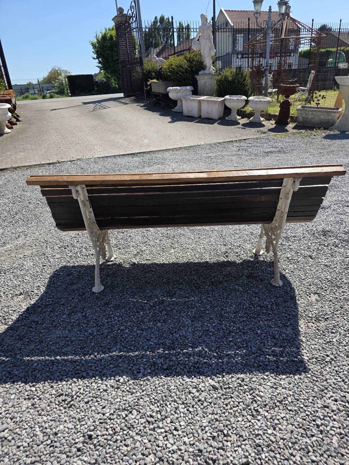 Antique garden bench made of cast iron and oak slats