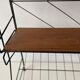 Free-standing shelf with a metal structure and 3 shelves, 1960s, Italy.