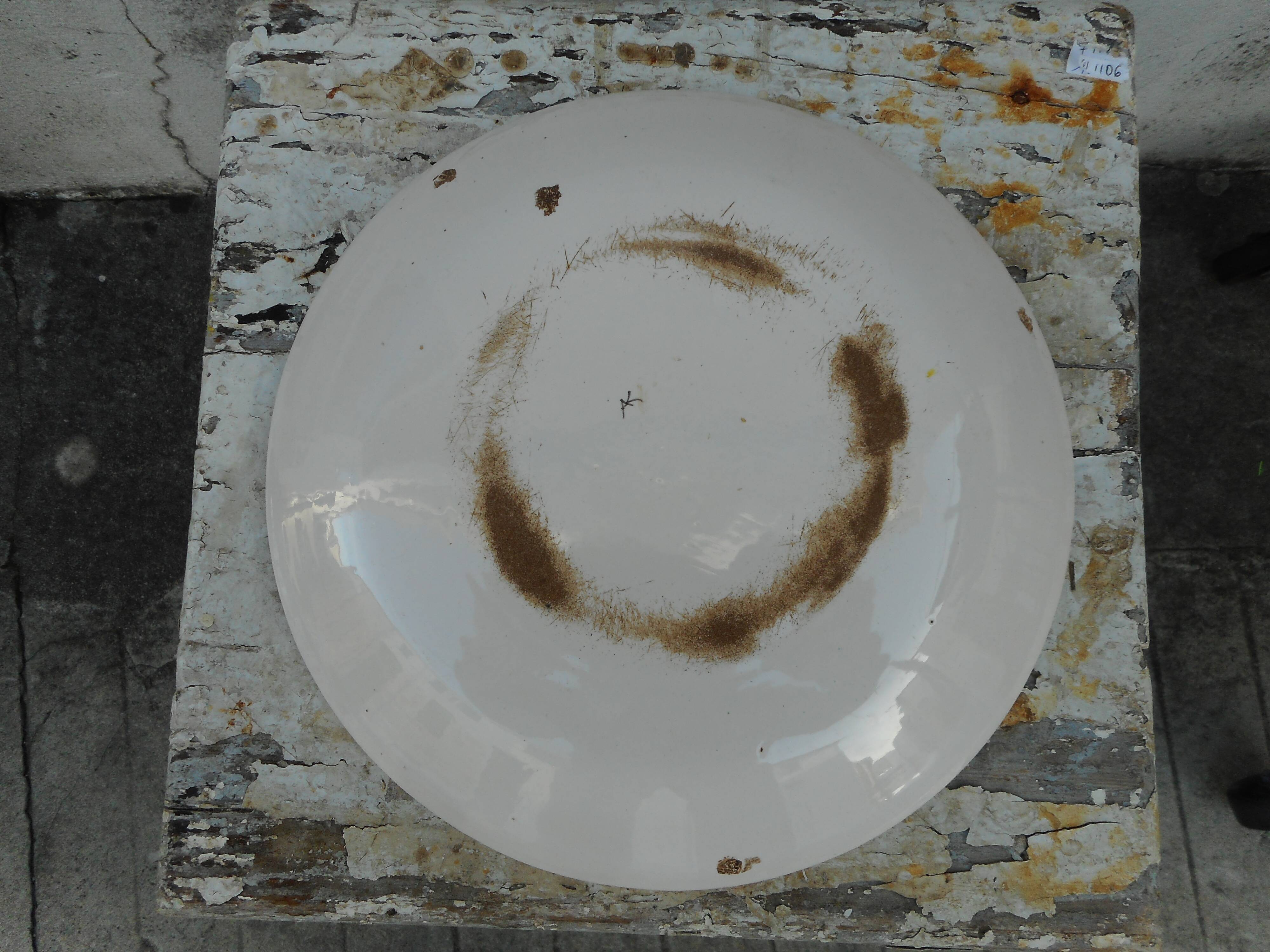 Ancient plate in earthenware