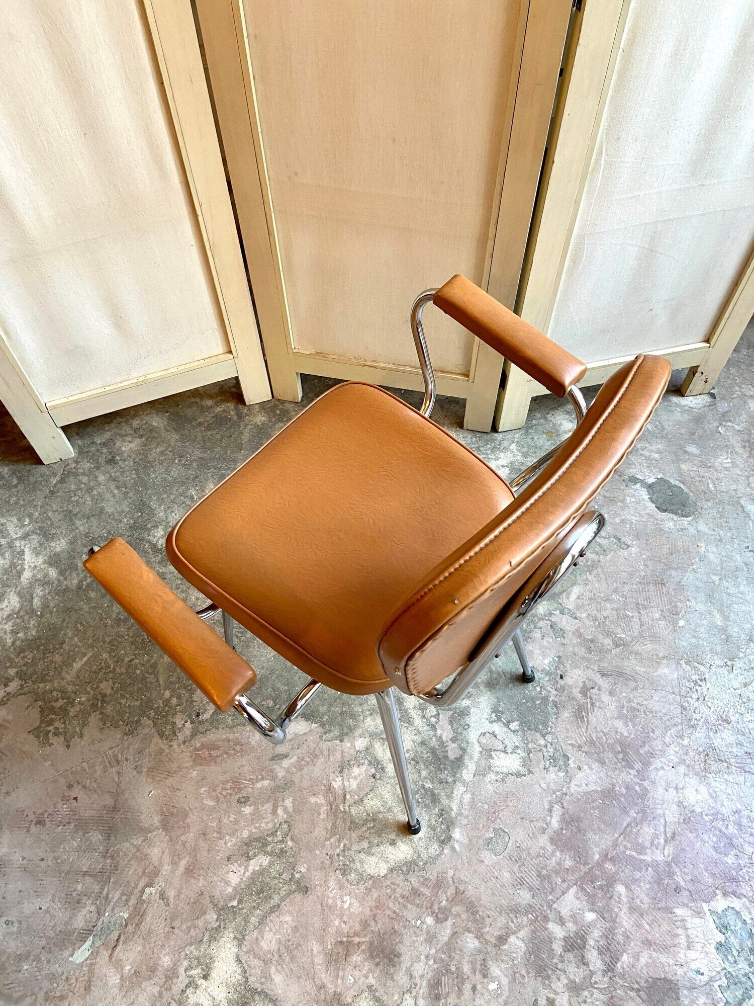 Armchair in chromed metal and tawny skaï 1950s