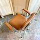 Armchair in chromed metal and tawny skaï 1950s