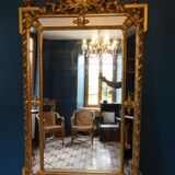 Miroir XIXème à parcloses en stuc doré 100 x 175 cm
