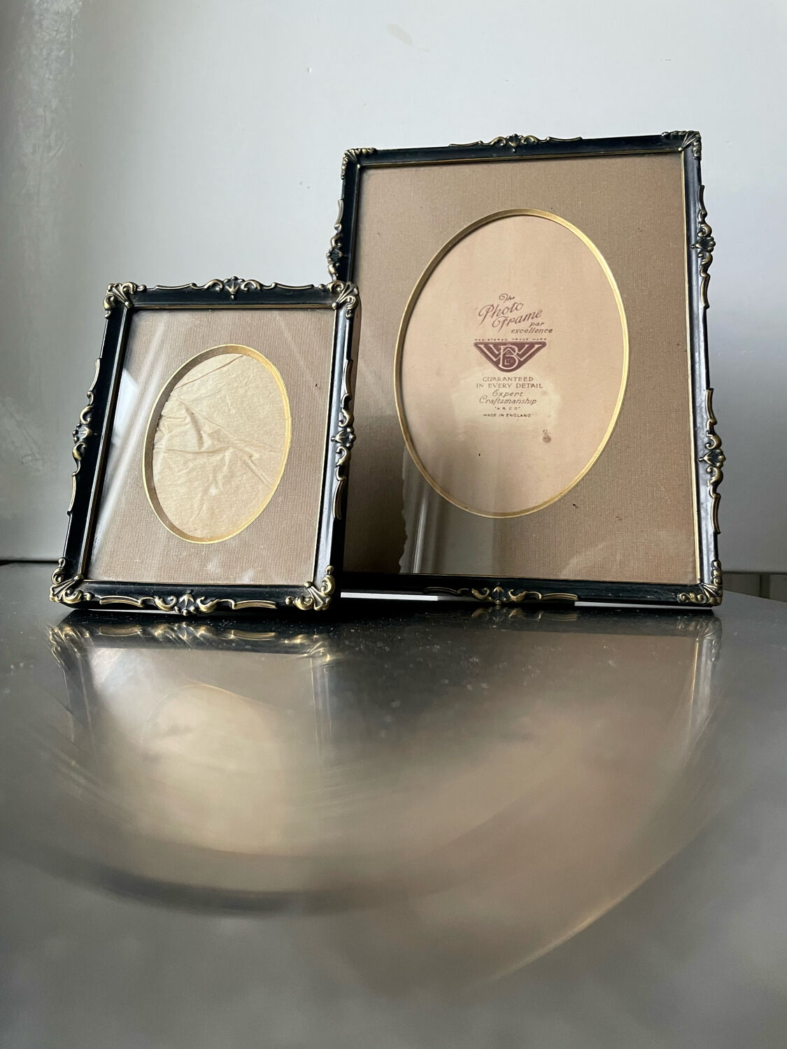 Pair of English Antique Metal Picture Frames in 2 different sizes