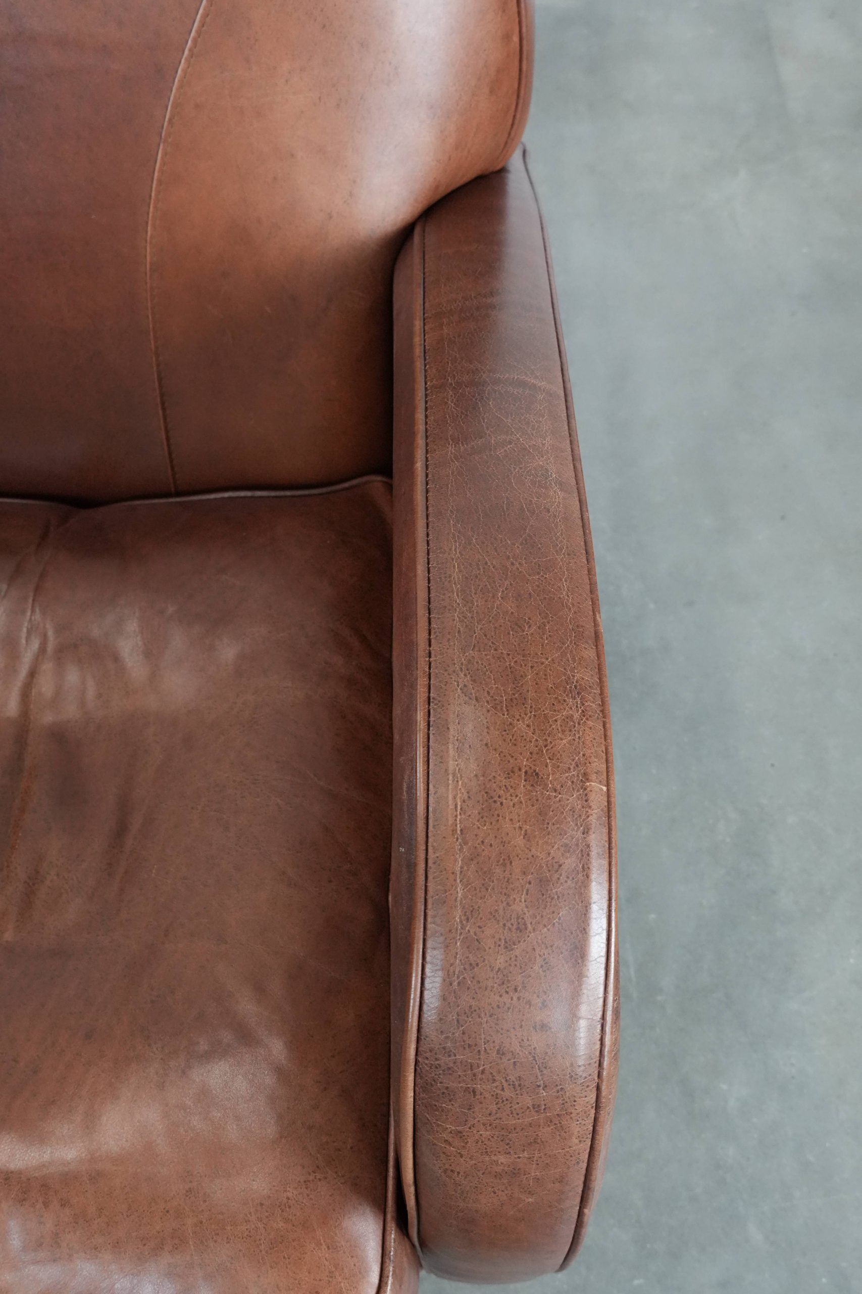 Beautiful art deco design armchair made of cowhide leather in English style