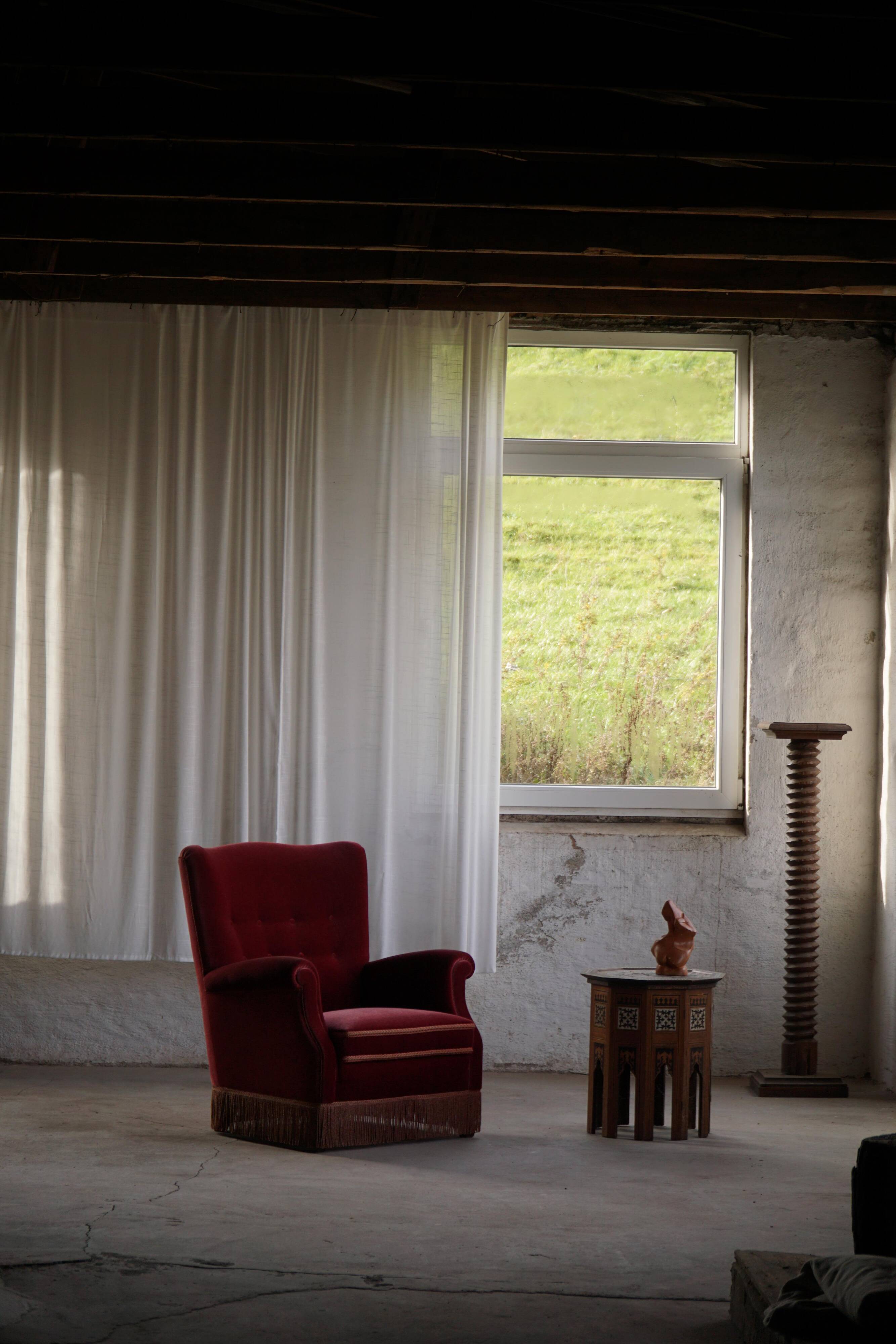 Pair of modern Danish lounge chairs, cherry red velvet, 1950s
