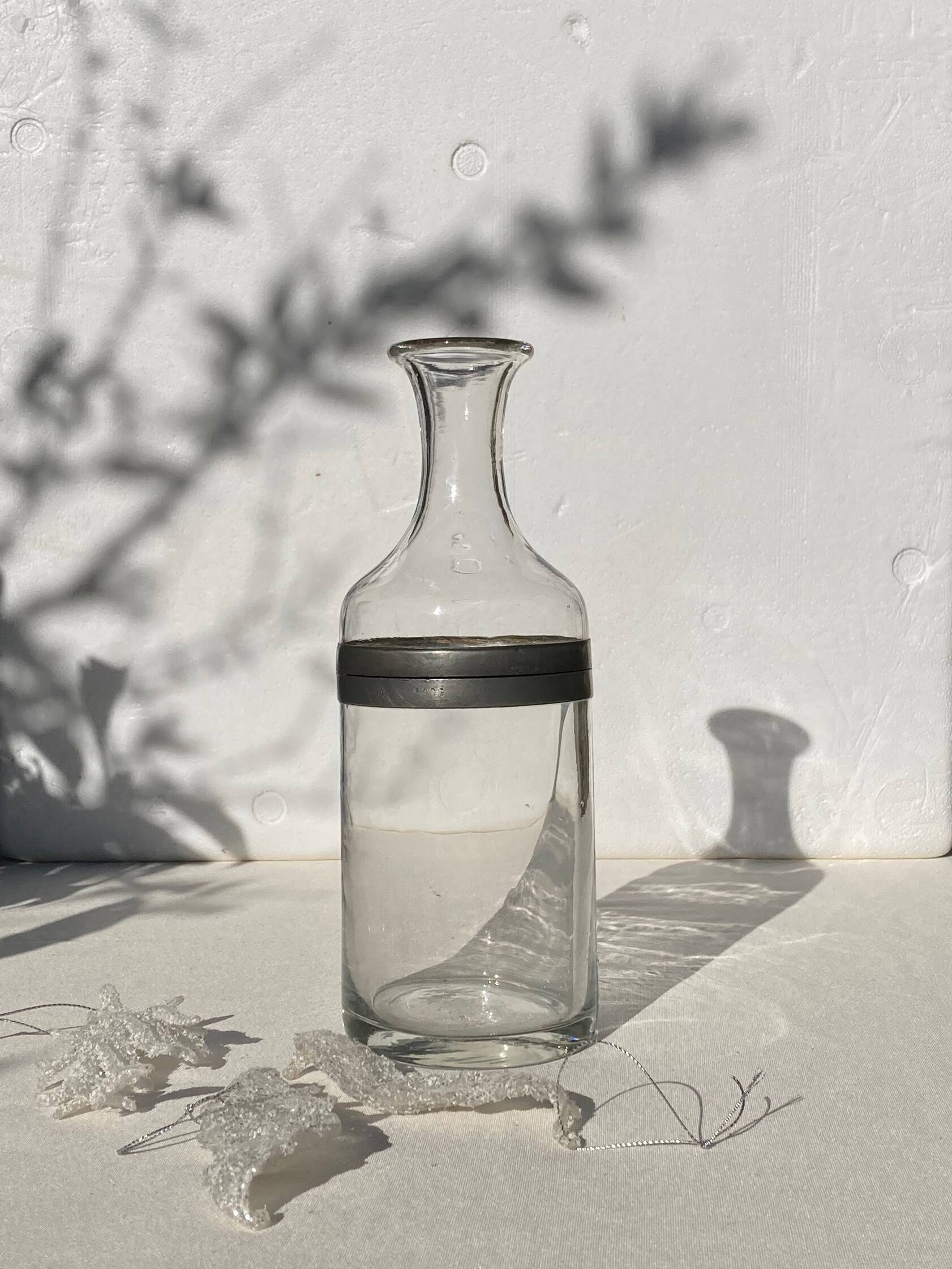 Glass and pewter screw carafe, early 20th century