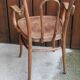 Curved wooden armchair