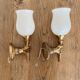 Set of 2 golden, bronze and brass torch wall lights
