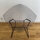 HARRY BERTOIA armchair for KNOLL "Diamond" in black metal. Old edition. Condition of use.