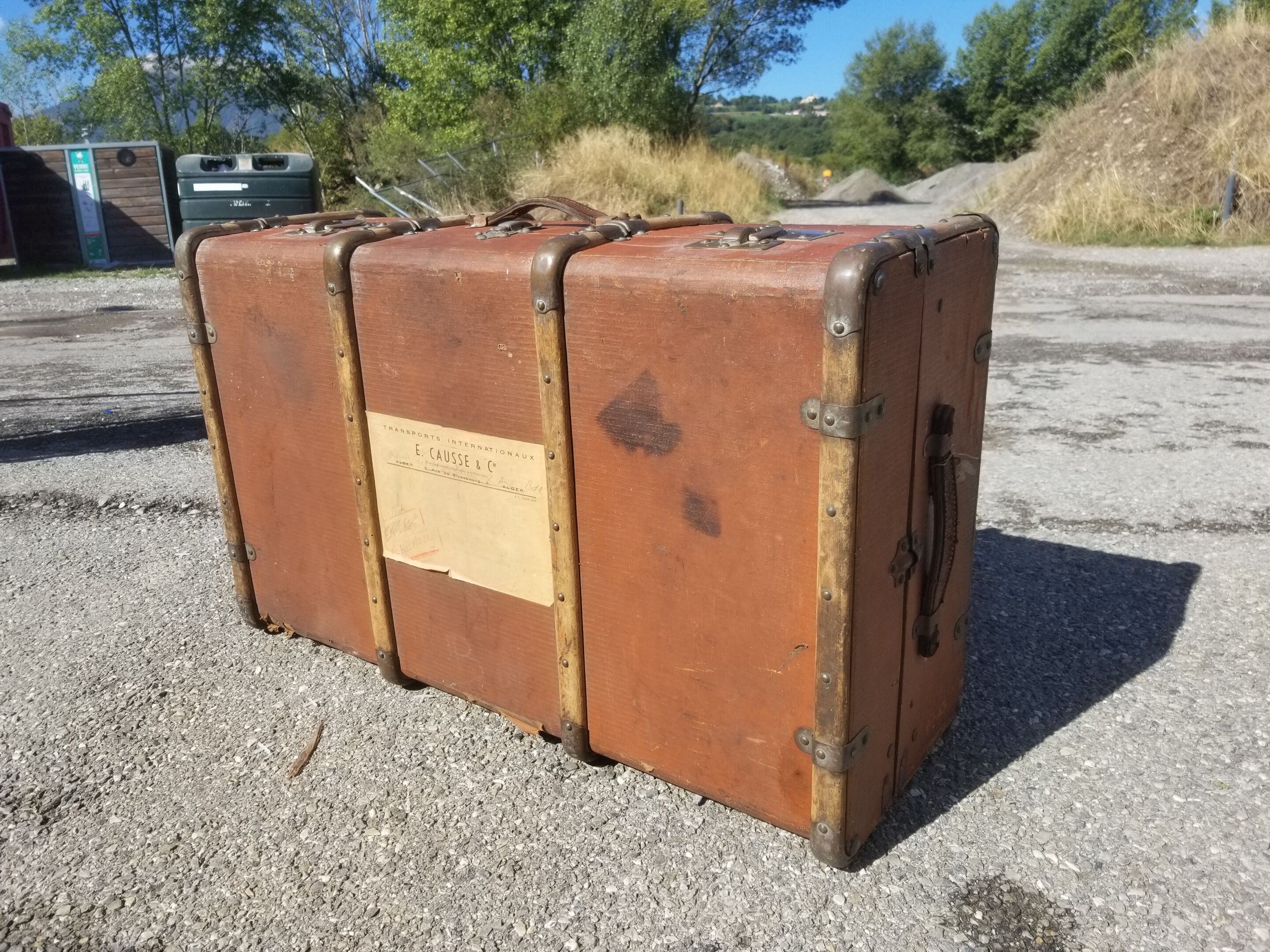 Old travel trunk made of wood and brass