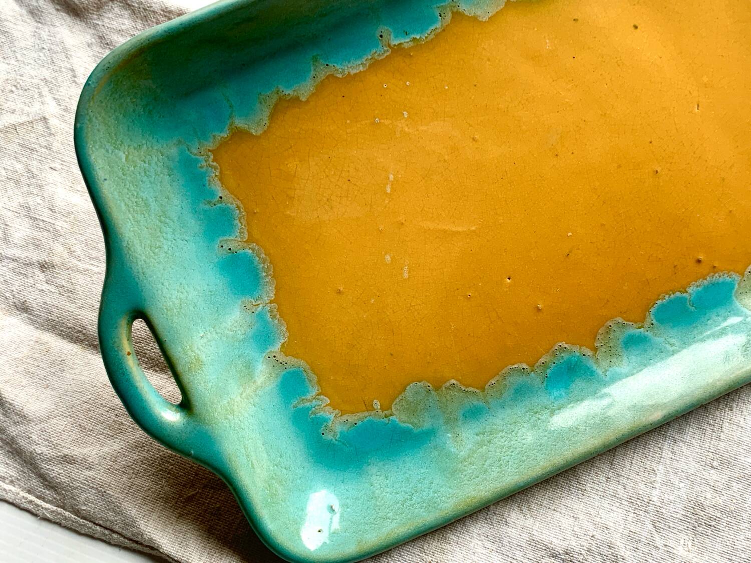 CAB turquoise and ochre ceramic dish with handles