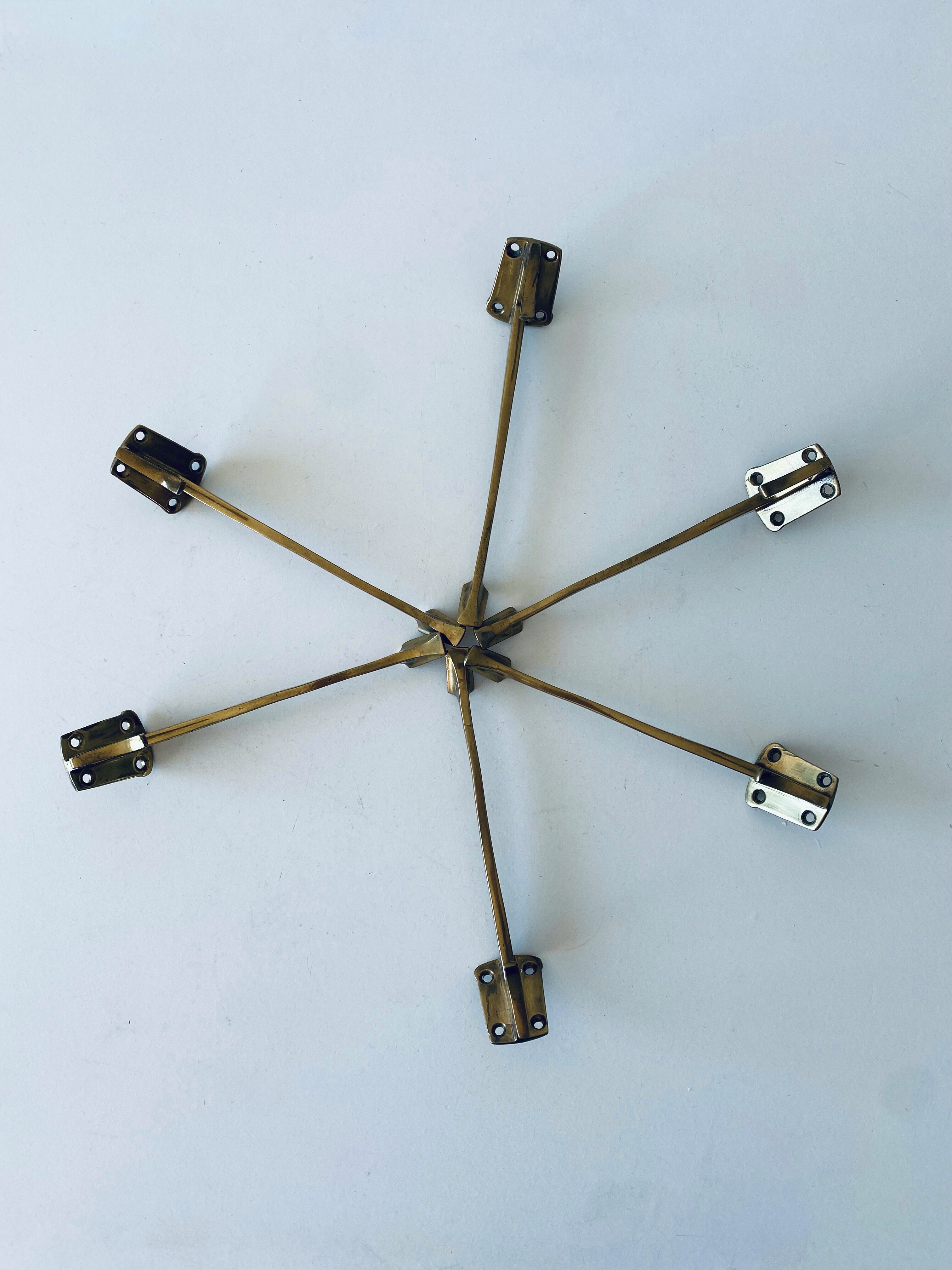 Pair of vintage brass hooks