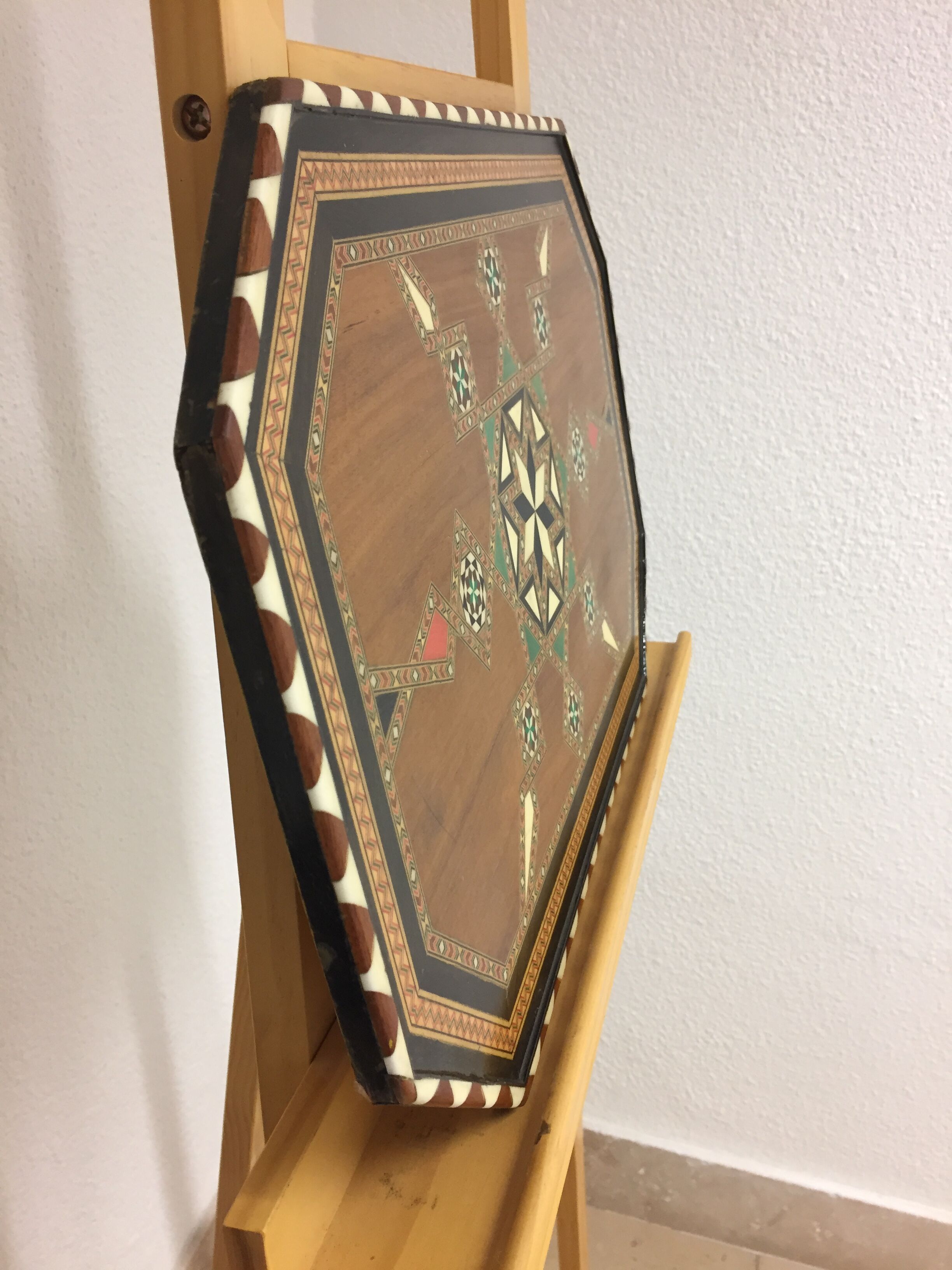 Old geometric marquetry top design'