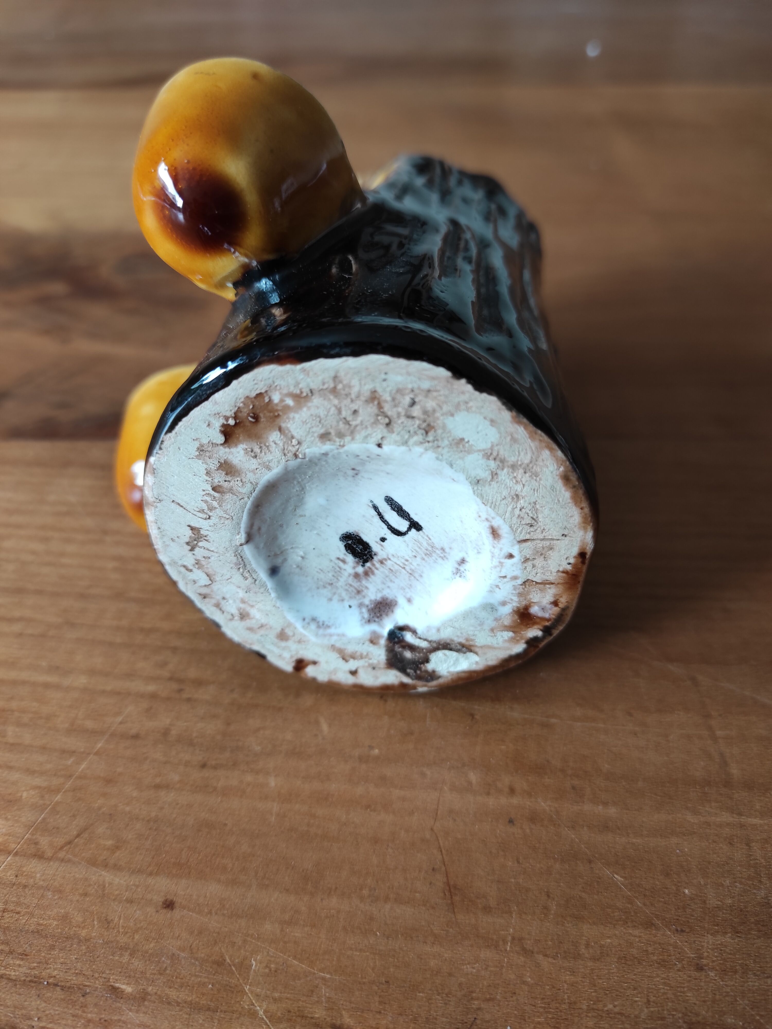 Ceramic vase with tree trunk decoration