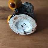 Ceramic vase with tree trunk decoration