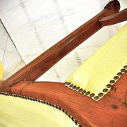 Wingback armchair in walnut in the French Regency style with stretcher in