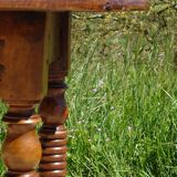 Antique walnut table with drop-leaf doors
